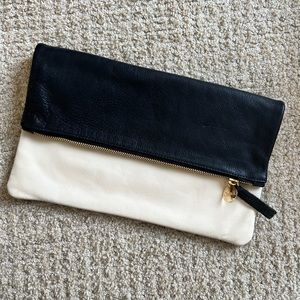 Clare V. Two toned fold over clutch in black and white